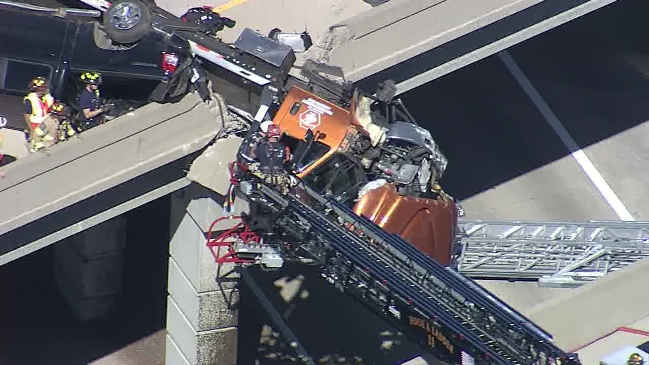 🔴LIVE: Tow truck hangs over overpass after crash | RESCUE IN PROGRESS